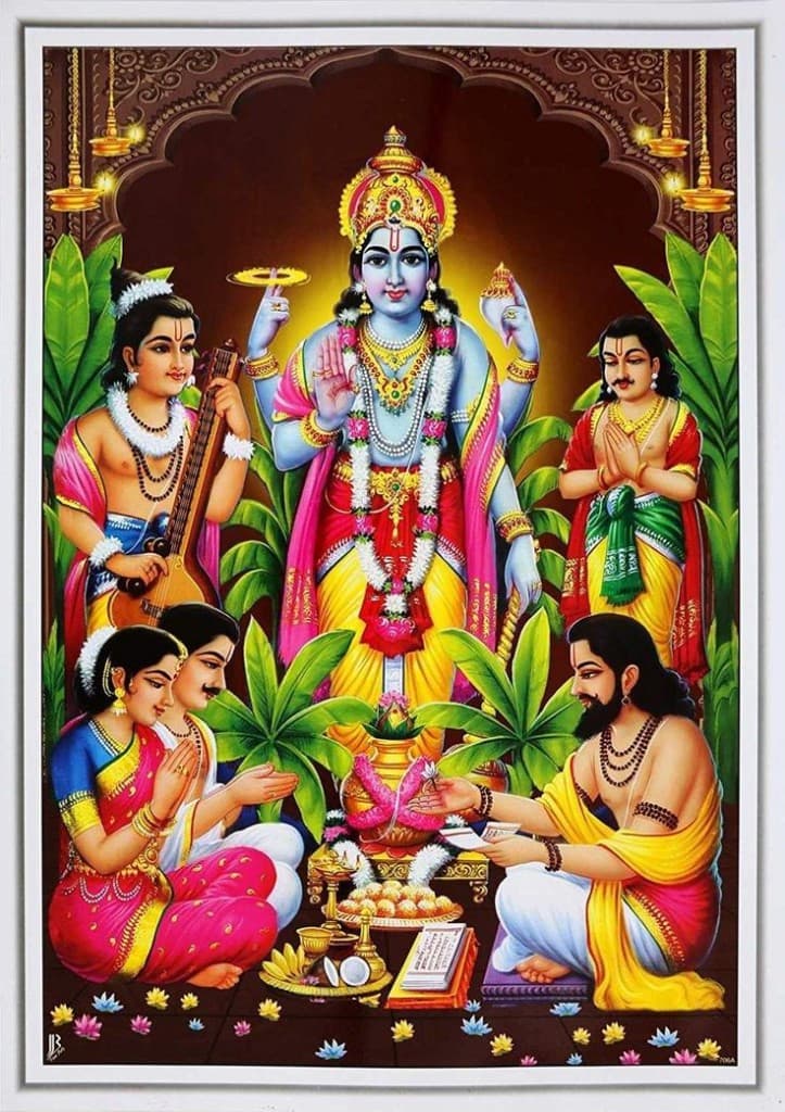 Sri Satyanarayana Swamy blessing devotees during the Satyanarayana Vratam